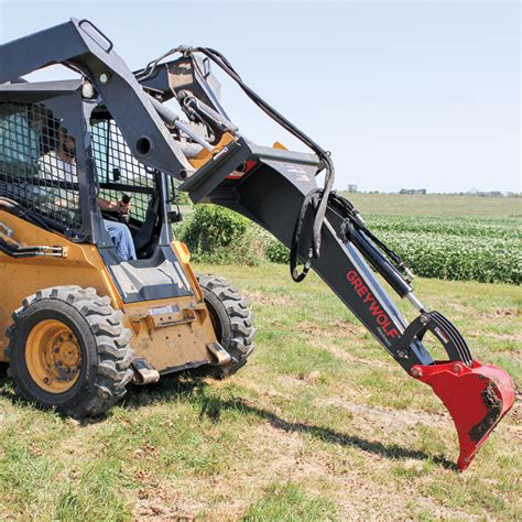 skid steer with backhoe attachment